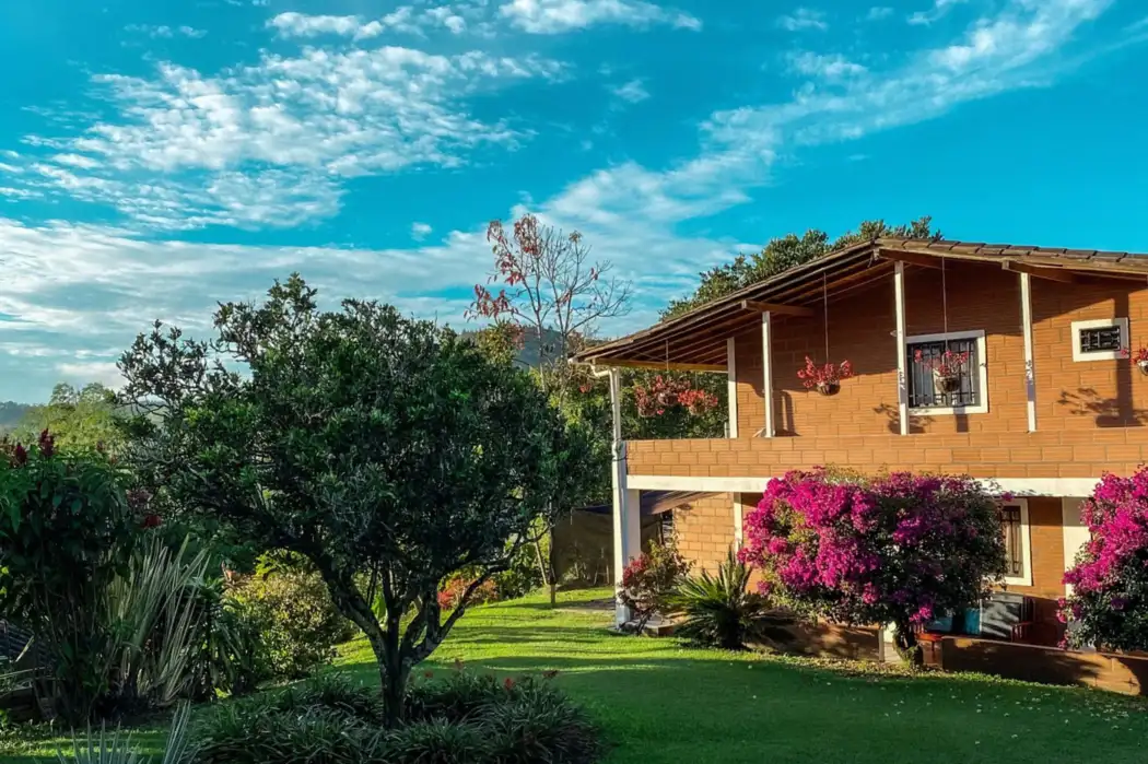 House with a completed flowering garden