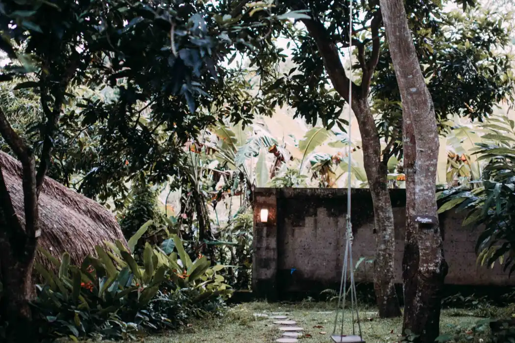 Stone path with garden swing