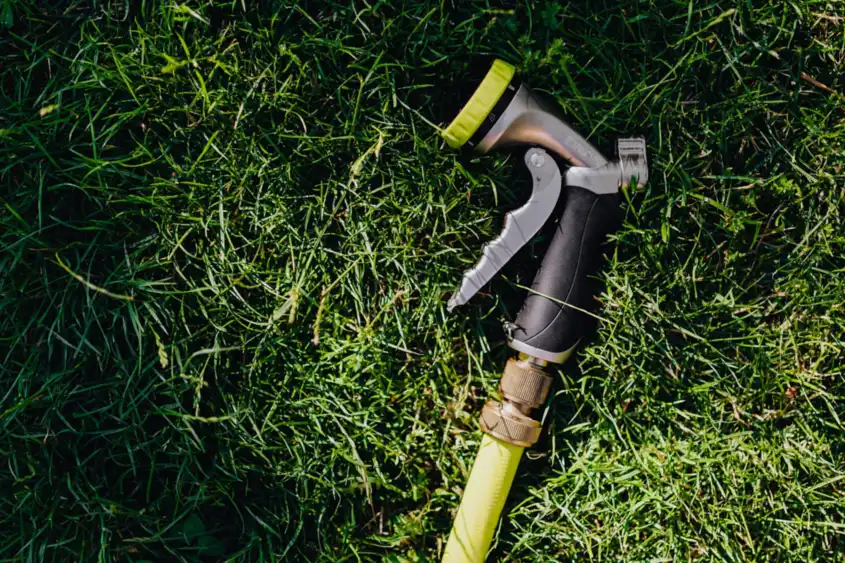 Garden hose on lawn